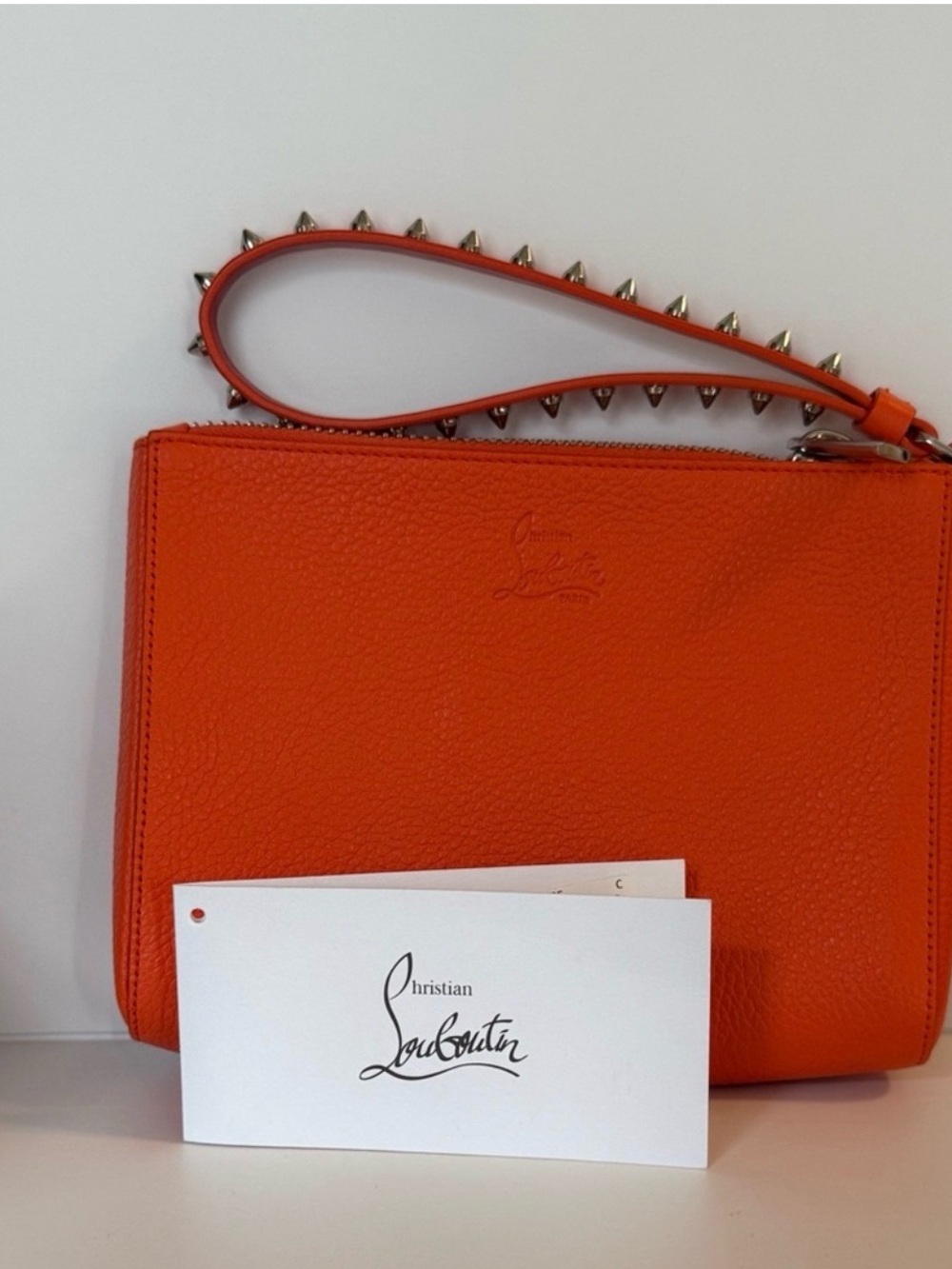 ✨💎NWT💎✨Christian Louboutin Orange Pebbled Leather Spike Wristlet - Picture 7 of 7
